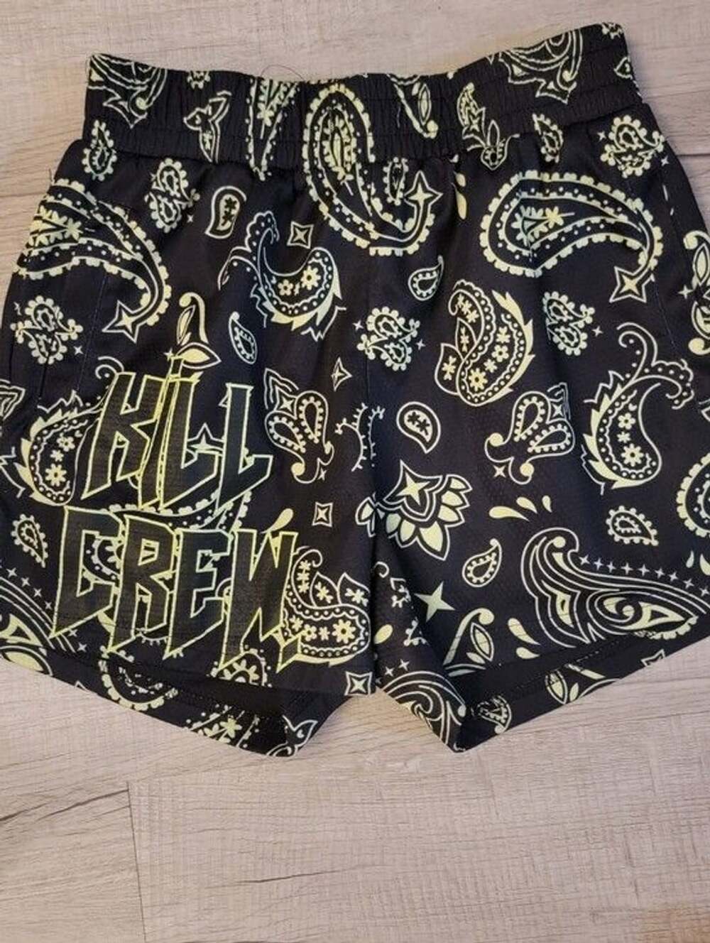 Kids Black Paisley Active Shorts with Neon Yellow Print